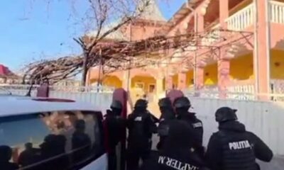 Percheziții și reținere într-un dosar de înșelăciune și fals